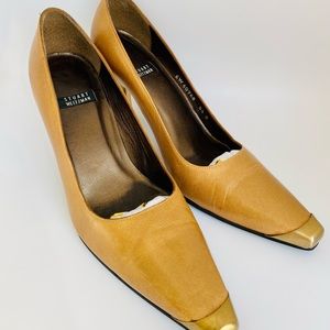 Steward Weitzman Dre’s shoes with metal on heel and toe